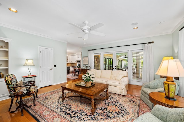 4319 SW 86th Way, Gainesville, FL 32608 - living room featuring ceiling fan, crown molding, wood finished floors, french doors, and recessed lighting