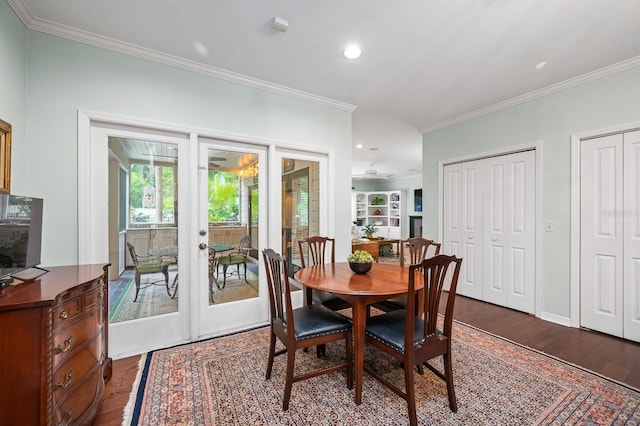 4319 SW 86th Way, Gainesville, FL 32608 - dining space with ornamental molding, french doors, dark wood-type flooring, a ceiling fan, and recessed lighting