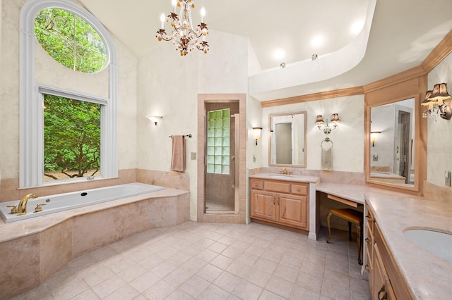 4319 SW 86th Way, Gainesville, FL 32608 - bathroom featuring two vanities, plenty of natural light, a bath, tile patterned flooring, and vaulted ceiling