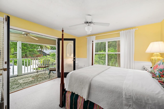 4319 SW 86th Way, Gainesville, FL 32608 - bedroom featuring carpet floors, access to outside, wainscoting, and a ceiling fan