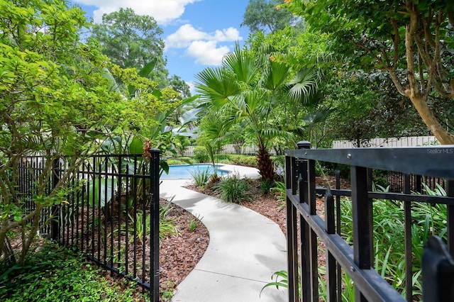 4319 SW 86th Way, Gainesville, FL 32608 - view of home's community with a fenced backyard and a swimming pool
