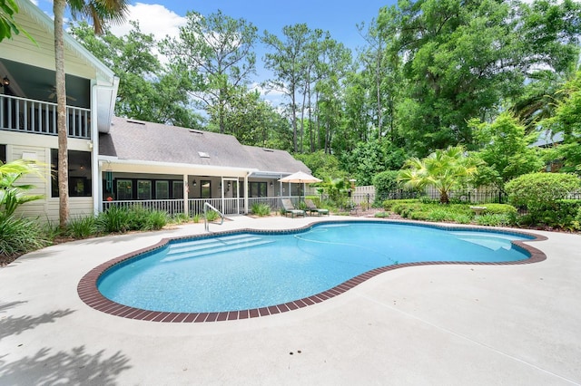 4319 SW 86th Way, Gainesville, FL 32608 - view of pool with a patio area and view of scattered trees