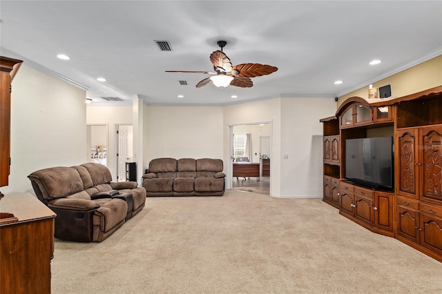 living room featuring light colored carpet, a ceiling fan, and recessed lighting