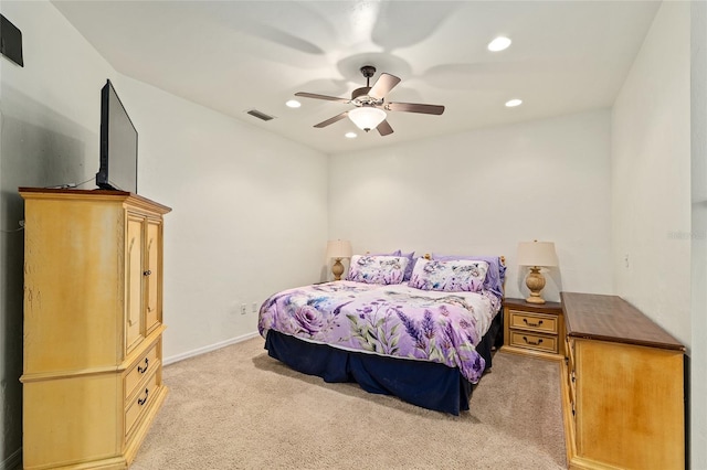 bedroom featuring visible vents, recessed lighting, light carpet, a ceiling fan, and baseboards