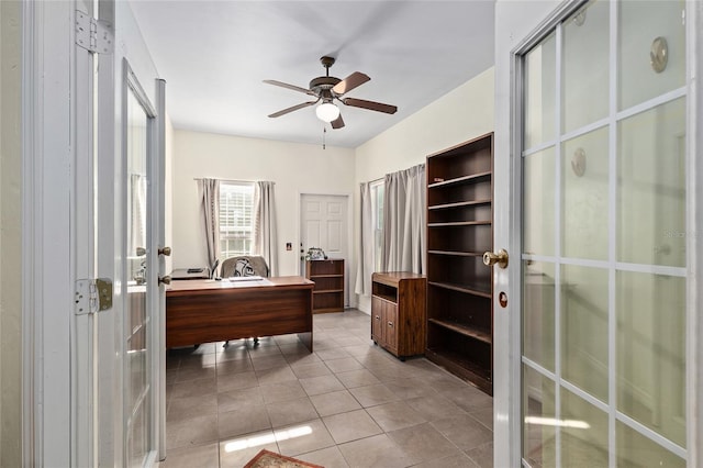 office space with a ceiling fan, tile patterned flooring, and french doors