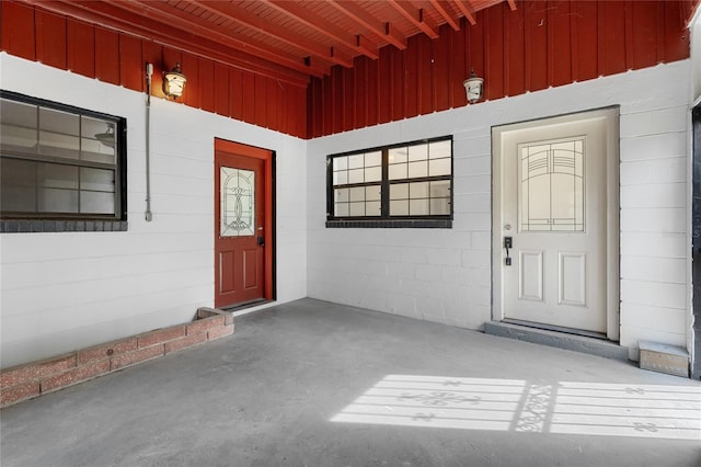 529 NE 12th Ct, Gainesville, FL 32601 - view of exterior entry featuring board and batten siding and covered porch