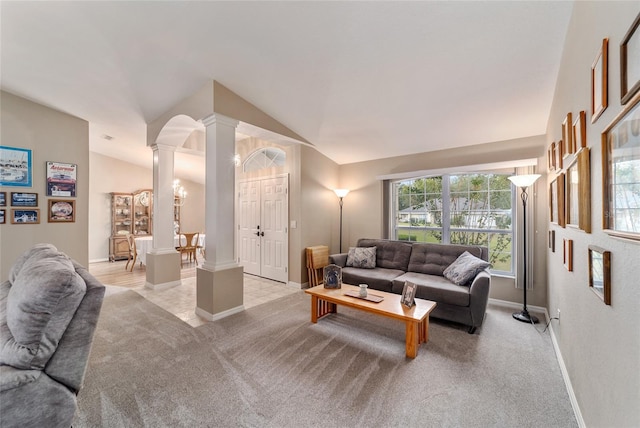 living area with baseboards, decorative columns, light carpet, and lofted ceiling