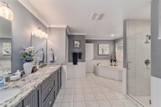 bathroom featuring visible vents, a sink, a bath, and tiled shower