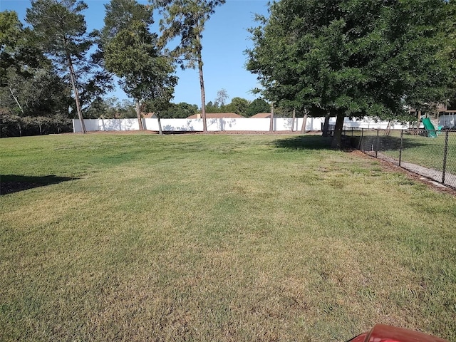 view of yard featuring fence