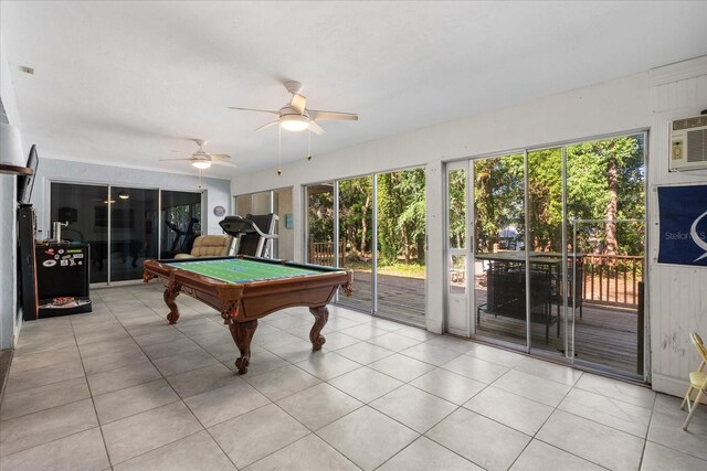 playroom with a ceiling fan, billiards, a wall unit AC, and light tile patterned floors