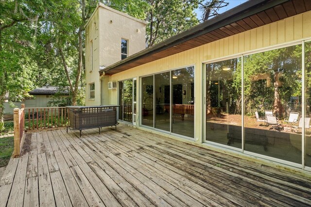 deck featuring a wall mounted AC