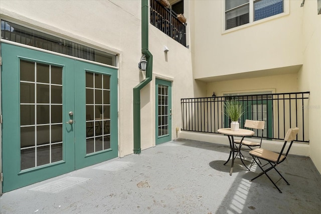 339 NE 2nd Ave, Gainesville, FL 32601 - view of patio featuring french doors