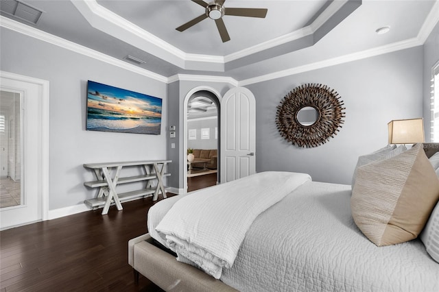 555 NW 134th Way, Newberry, FL 32669 - bedroom featuring visible vents, ornamental molding, wood finished floors, and a raised ceiling
