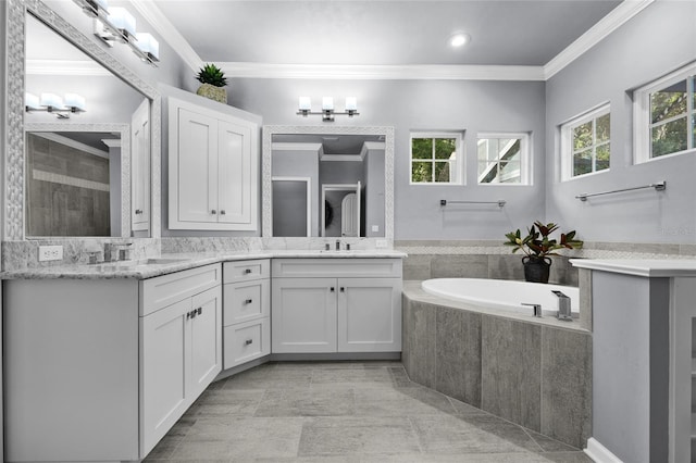 555 NW 134th Way, Newberry, FL 32669 - full bathroom featuring crown molding, a sink, a bath, and double vanity