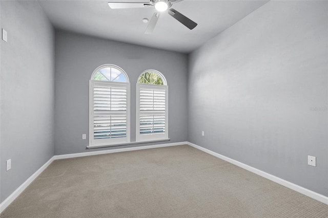 555 NW 134th Way, Newberry, FL 32669 - unfurnished room featuring carpet floors, a ceiling fan, and baseboards