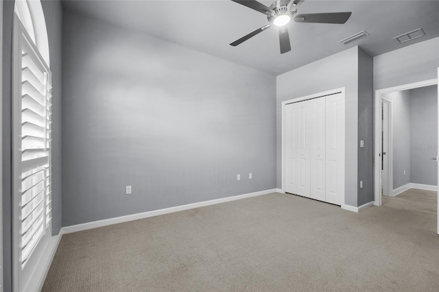 555 NW 134th Way, Newberry, FL 32669 - unfurnished bedroom with visible vents, carpet, baseboards, and a closet