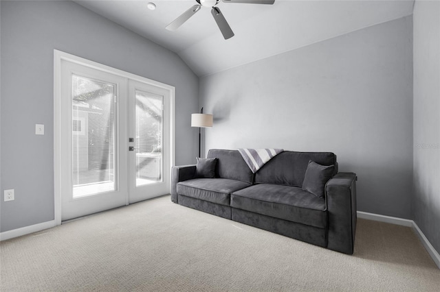 555 NW 134th Way, Newberry, FL 32669 - carpeted living room with baseboards, a ceiling fan, and lofted ceiling