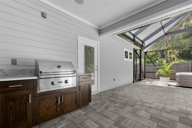 555 NW 134th Way, Newberry, FL 32669 - view of patio / terrace with grilling area, exterior kitchen, fence, and glass enclosure
