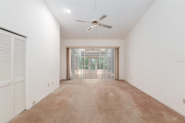 1020 NW 124th Dr, Newberry, FL 32669 - carpeted empty room with a ceiling fan, baseboards, and lofted ceiling