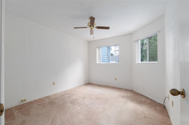 1020 NW 124th Dr, Newberry, FL 32669 - carpeted empty room featuring a ceiling fan and baseboards
