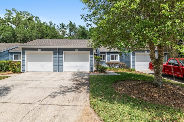 1020 NW 124th Dr, Newberry, FL 32669 - view of front of house with concrete driveway and roof with shingles