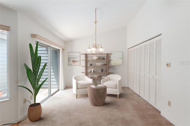 1020 NW 124th Dr, Newberry, FL 32669 - sitting room featuring carpet flooring, a chandelier, lofted ceiling, and baseboards