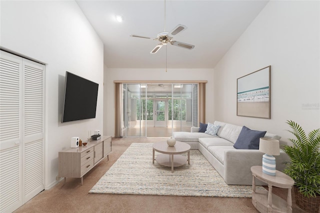 1020 NW 124th Dr, Newberry, FL 32669 - living area with ceiling fan, light carpet, and high vaulted ceiling