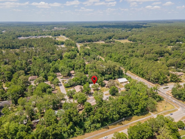 drone / aerial view of a heavily wooded area