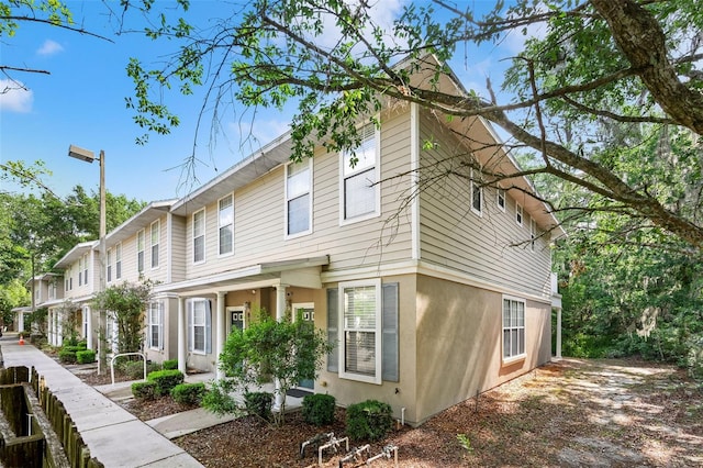 view of home's exterior with stucco siding