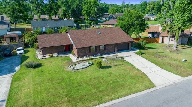 birds eye view of property with a residential view