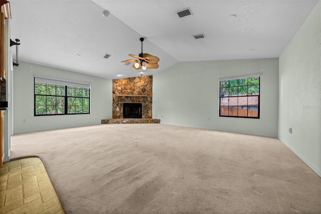 unfurnished living room with carpet floors, a ceiling fan, and visible vents