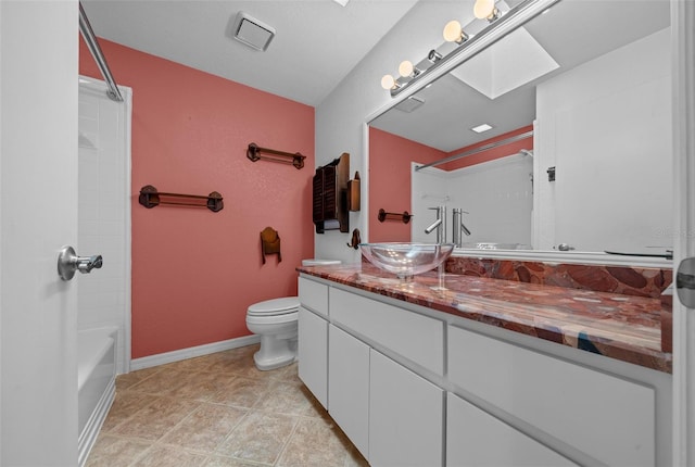 full bathroom featuring toilet, baseboards, bathtub / shower combination, and vanity