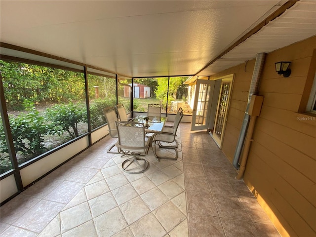 3900 NW 21st Ter, Gainesville, FL 32605 - sunroom with outdoor dining area