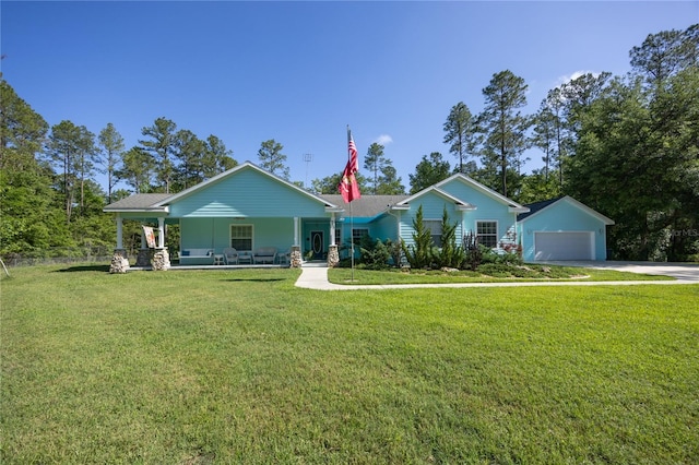 8652 NW 198th Ln, Alachua, FL 32615 - view of front of property featuring a garage, concrete driveway, a porch, and a front lawn