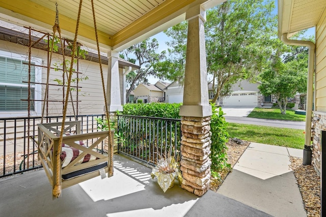 1488 NW 120th Way, Gainesville, FL 32606 - view of patio / terrace featuring a porch