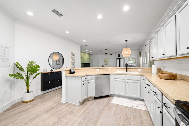 1488 NW 120th Way, Gainesville, FL 32606 - kitchen with a sink, light wood-style floors, stainless steel appliances, a peninsula, and visible vents