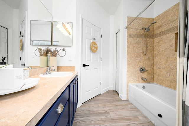1488 NW 120th Way, Gainesville, FL 32606 - bathroom featuring shower / tub combination, wood finished floors, and vanity