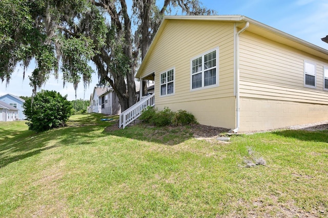 1488 NW 120th Way, Gainesville, FL 32606 - view of side of property with a lawn