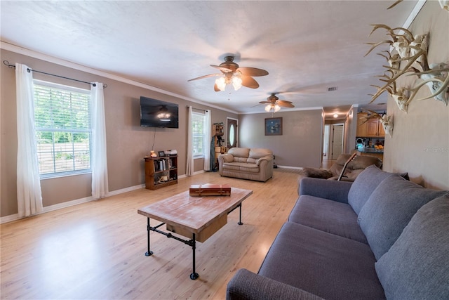5876 SW 52nd Ter, Lake Butler, FL 32054 - living area with light wood-type flooring, ornamental molding, baseboards, and a ceiling fan