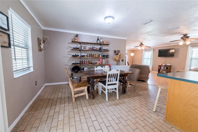 5876 SW 52nd Ter, Lake Butler, FL 32054 - dining area with visible vents, a ceiling fan, baseboards, and brick floor