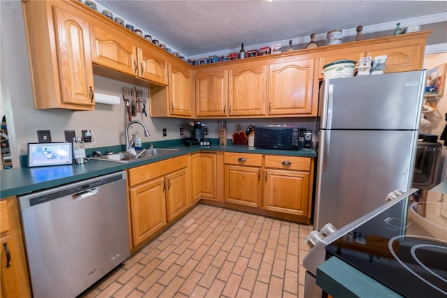 5876 SW 52nd Ter, Lake Butler, FL 32054 - kitchen with a sink, brick patterned floor, dark countertops, and stainless steel appliances