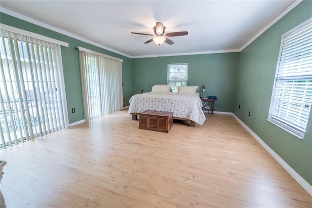 5876 SW 52nd Ter, Lake Butler, FL 32054 - bedroom featuring light wood-style floors, baseboards, and ornamental molding