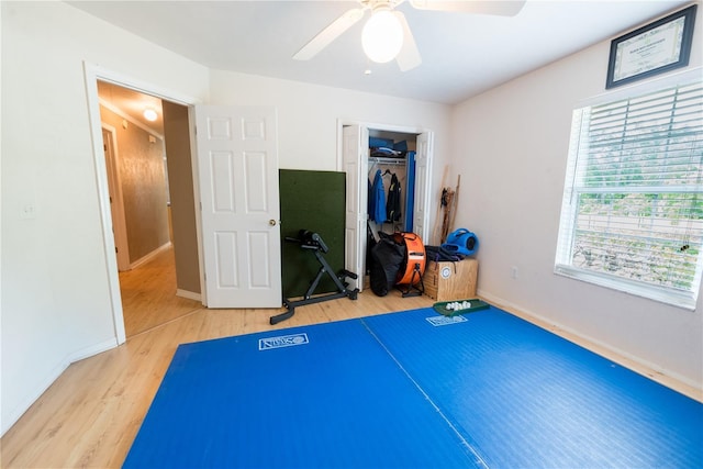 5876 SW 52nd Ter, Lake Butler, FL 32054 - workout area with baseboards, ceiling fan, and light wood-type flooring
