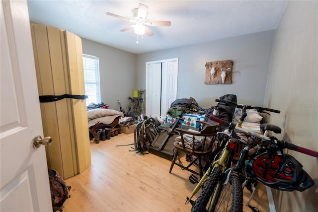 5876 SW 52nd Ter, Lake Butler, FL 32054 - bedroom with a closet, ceiling fan, and light wood-style floors