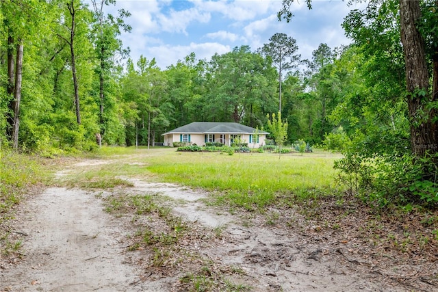 5876 SW 52nd Ter, Lake Butler, FL 32054 - ranch-style home featuring a view of trees