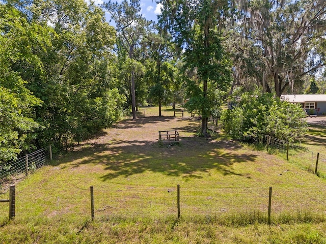 view of yard with fence