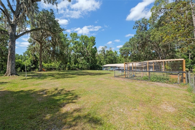 view of yard featuring fence