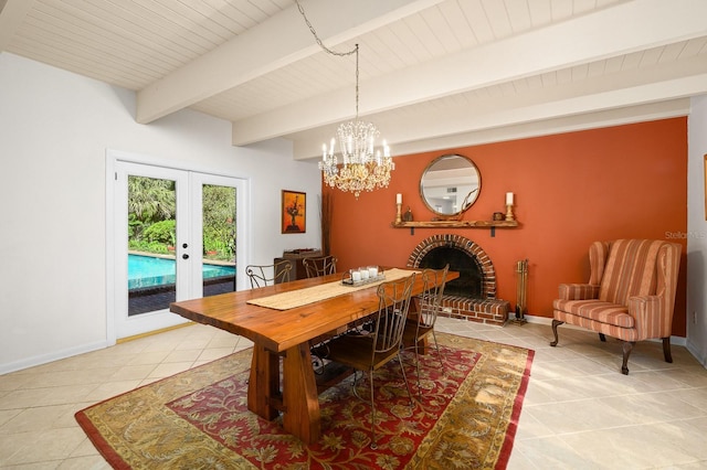 dining space with french doors, beam ceiling, baseboards, a chandelier, and light tile patterned flooring