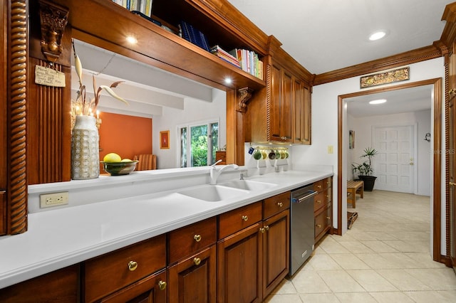 kitchen featuring dishwasher, a sink, light countertops, light tile patterned floors, and recessed lighting