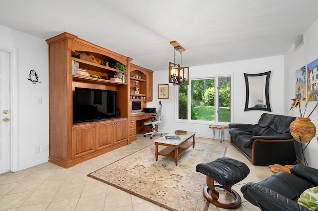 living area featuring visible vents, baseboards, light tile patterned floors, and a notable chandelier